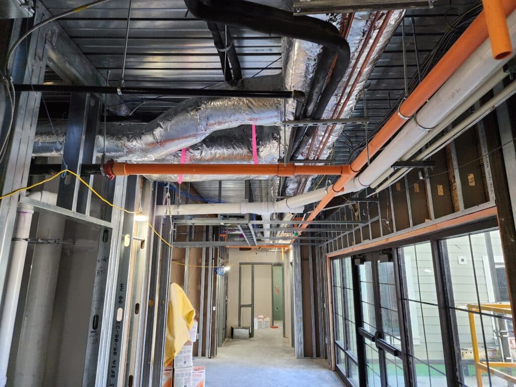 metal work on the ceiling of a building